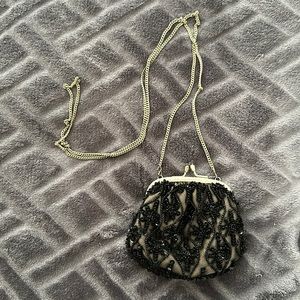 Bebe vintage style coin purse with shoulder chain